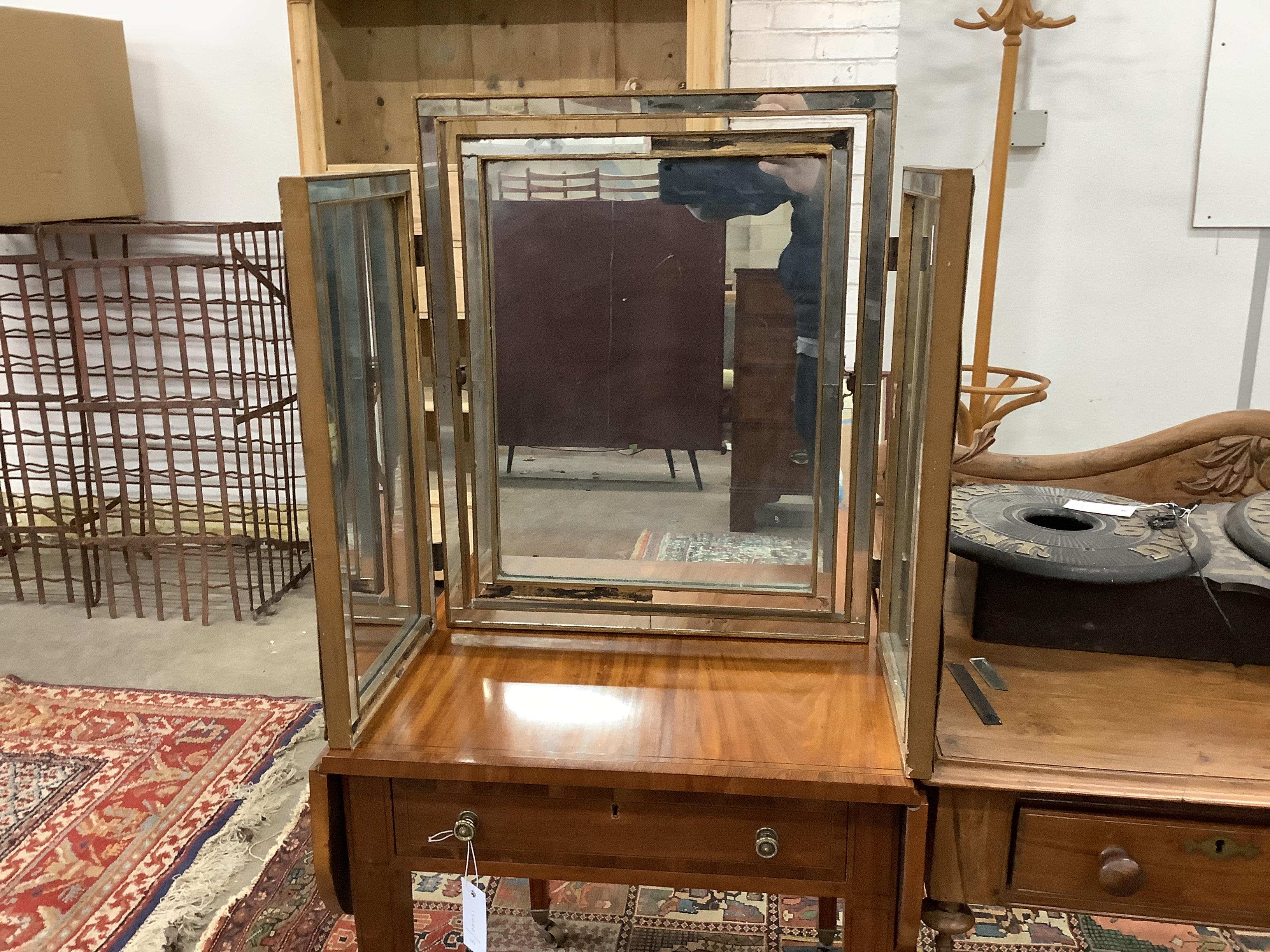 A Venetian triple folding dressing table mirror, height 56cm